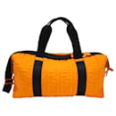 Fendi Allover Embossed Logo Duffle Bag in Orange Nylon