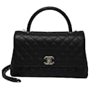 Black Quilted Caviar Coco Top Handle Gold Hardware - Chanel