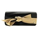 NEW CHANEL BOW POUCH HANDBAG IN BLACK & GOLD SATIN CLUTCH BAG - Chanel