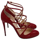 Christian Louboutin Soustelissimo Crisscross Pumps in Red Patent Leather
