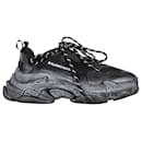 Balenciaga Distressed Triple S Sneakers in Black Polyester