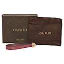 Breloque bracelet en cuir verni 282562 - Gucci
