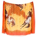 Bufanda Hermès con estampado de caballos en algodón naranja