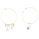 Boucles d'oreilles créoles monogramme en perles dorées - Louis Vuitton