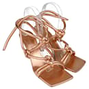 Sandálias com nó em ouro rosa metálico - Bottega Veneta