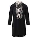 Kleid von Sandro Paris mit Spitzeneinsatz und Schleifenkragen aus schwarzem Polyester
