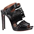AlaÏa Cut Out Ankle-Strap Sandals in Black Leather - Alaïa