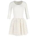 Mini-robe à jupe perforée Alaia en coton blanc - Alaïa
