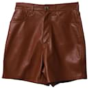 Nanushka High-Waisted Shorts in Brown leather