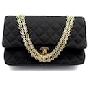VINTAGE CHANEL TIMELESS HANDBAG IN BLACK QUILTED JERSEY CANVAS HAND BAG - Chanel