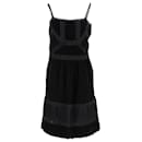 Ärmelloses Moschino-Kleid aus schwarzer Baumwolle mit Spitzenbesatz