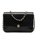 CC Quilted Leather Flap Bag - Chanel