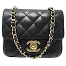 CHANEL TIMELESS HANDBAG BLACK QUILTED MICRO LEATHER HAND BAG POUCH - Chanel