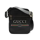 Bolsa tiracolo com zíper e logotipo de couro 523591 - Gucci