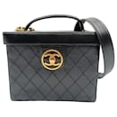 Chanel Chanel quilted cosmetic bag in black leather and gold chain