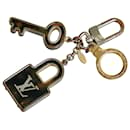 Porta-chaves e pingente de bolsa Louis Vuitton Gold Porte Cles Confidence