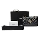 CHANEL Portemonnaie an Kettentasche aus schwarzem Leder - 101549 - Chanel