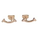 TIFFANY & CO 18Boucles d'oreilles K T SMile Boucles d'oreilles en métal en excellent état - Tiffany & Co