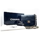 Chanel Mini Timeless Handtasche aus schwarzem gestepptem Leder