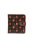 Louis Vuitton Monogram Cherry Bifold Compact Wallet Cartera corta de lona M95005 en buen estado