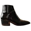 Black patent leather ankle boots The Kooples