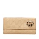 Portefeuille long marron Gucci Guccissima Lovely