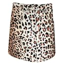Louis Vuitton Abbronzatura / Minigonna in cotone con stampa leopardata nera - Autre Marque