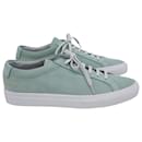 Common Projects Original Achilles Low Perforated Sneakers in Teal Calfskin Leather - Autre Marque