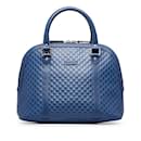 Blaue Gucci mittelgroße Microguccissima-Kuppeltasche