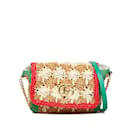 Bandolera Gucci pequeña de rafia GG Marmont marrón