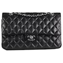 De color negro 2014 Bolso clásico de piel de cordero con solapa forrada y herrajes plateados - Chanel