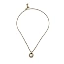 Colar de corrente com pingente redondo com logotipo pequeno de metal dourado - Christian Dior