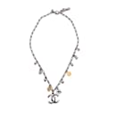 Collier chaîne en métal argenté avec pendentif charms logo CC - Chanel