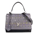 Bolso satchel Louis Vuitton LockMe II BB con ojales marrón