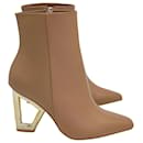 Cult Gaia Cut-Out Bamboo Heel Ankle Boots in Brown Leather