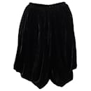 Mini-jupe asymétrique Alaia en polyester noir - Alaïa