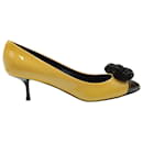 Giuseppe Zanotti Embellished Bow Pumps in Yellow Patent Leather