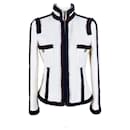 Jaqueta de tweed com botões CC para colecionadores - Chanel