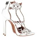 Alaïa Laser-Cut Sandals in White Leather