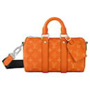 LV Keepall 25 laranja taigarama - Louis Vuitton