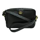 Bolsa de ombro de couro com relevo GG Marmont 710861 - Gucci