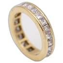 Gold Wedding Ring with Princess Cut Diamonds - Autre Marque