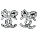Chanel earrings ribbon with CC logo