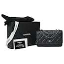 CHANEL Portemonnaie an Kettentasche aus schwarzem Leder - 101617 - Chanel