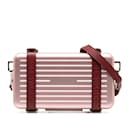 Bolsa crossbody rosa Dior x Rimowa para utilidades pessoais