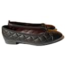 Chanel CC Cap Toe Bow Quilted Ballet Flats in Black Leat