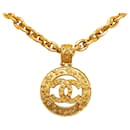 Collier pendentif rond Chanel CC doré