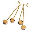 Louis Vuitton Boucles d'oreilles pendantes Gamble en cristal doré