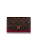 Portafoglio Flore monogramma Louis Vuitton marrone su catena