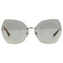 Braune, übergroße Sonnenbrille mit Schriftzug auf den Gläsern - Dolce & Gabbana